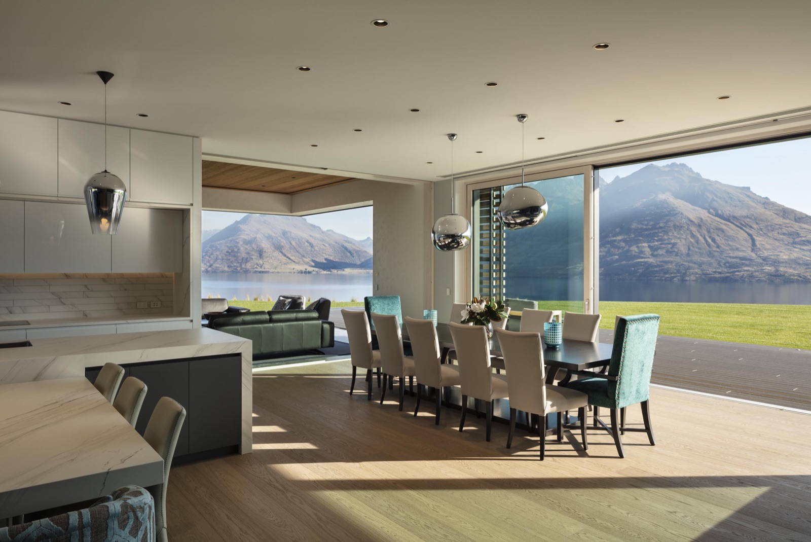 Te Toka completed — kitchen and dining room with the same Lake Wakatipu view
